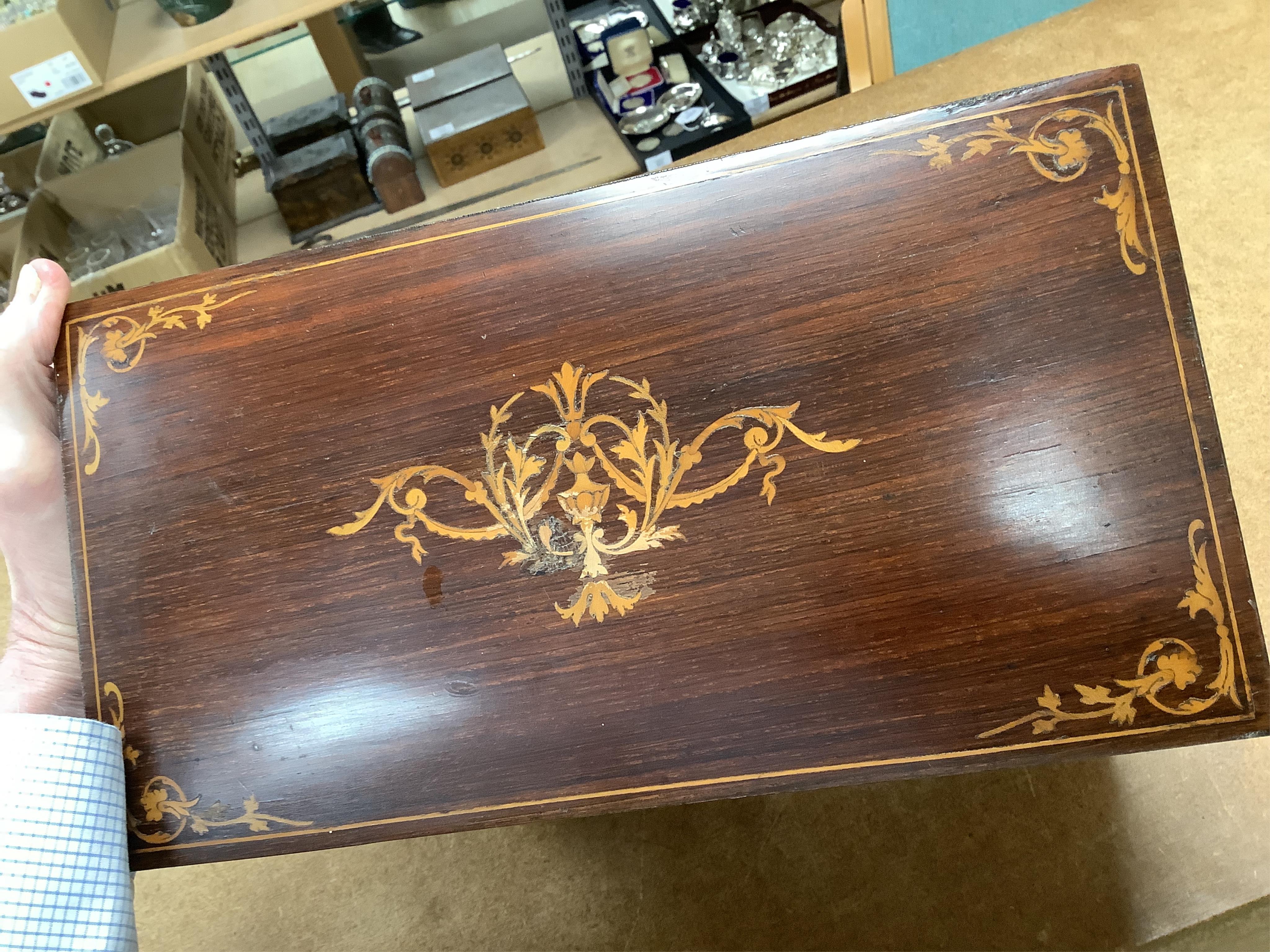 An Edwardian inlaid mahogany writing casket with fitted interior and a late Victorian faded walnut cigar box, largest 32cm wide